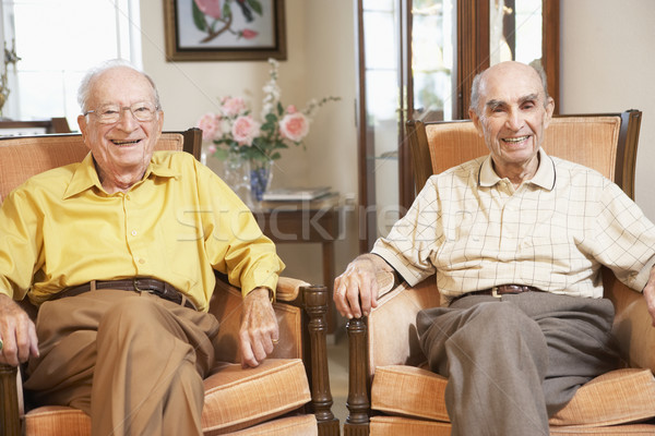 Idős férfiak megnyugtató barátok személy mosolyog Stock fotó © monkey_business