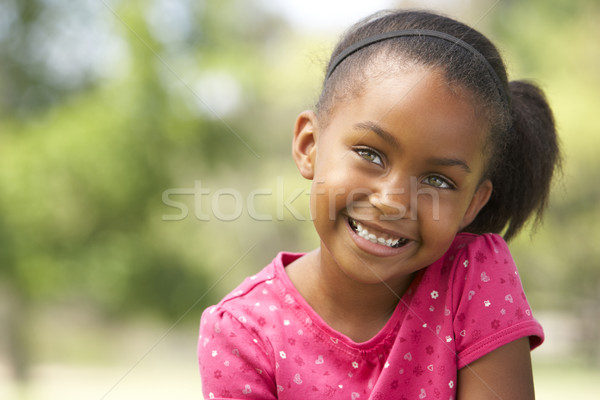 Portré fiatal lány ül park lány mosoly Stock fotó © monkey_business