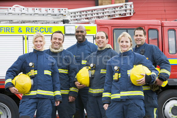 Portrait of a group of firefighters by a fire engine Stock photo © monkey_business