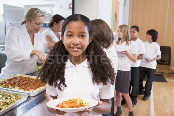 Zdjęcia stock: Uczennica · tablicy · obiad · szkoły