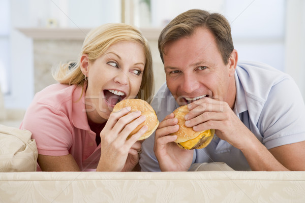 Couple Enjoying Burgers Together Stock photo © monkey_business