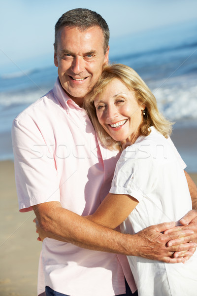 Senior Couple Enjoying Romantic Beach Holiday Stock photo © monkey_business