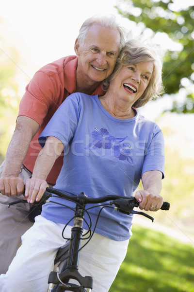 Pareja de ancianos ciclo mujer hombre ejercicio bicicleta Foto stock © monkey_business
