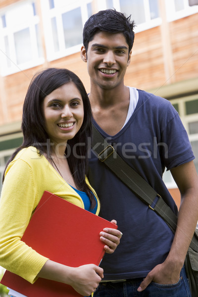 Mannelijke vrouwelijke college studenten campus gebouw Stockfoto © monkey_business