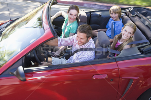 Family in convertible car smiling Stock photo © monkey_business