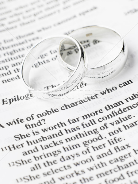 Silver Wedding Rings Resting On A Book Stock photo © monkey_business