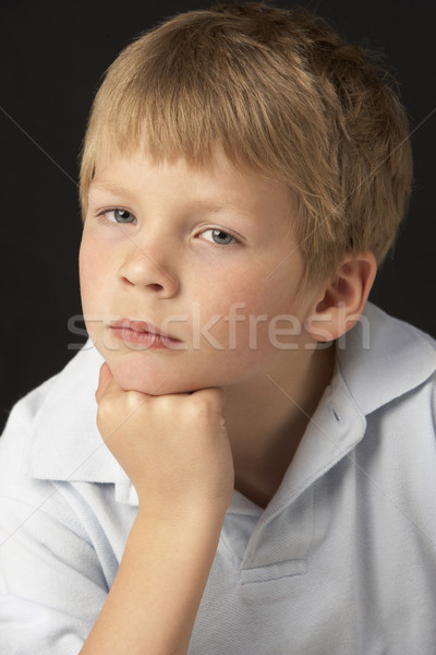 Studio Portrait Of Thoughtful Young Boy Stock photo © monkey_business