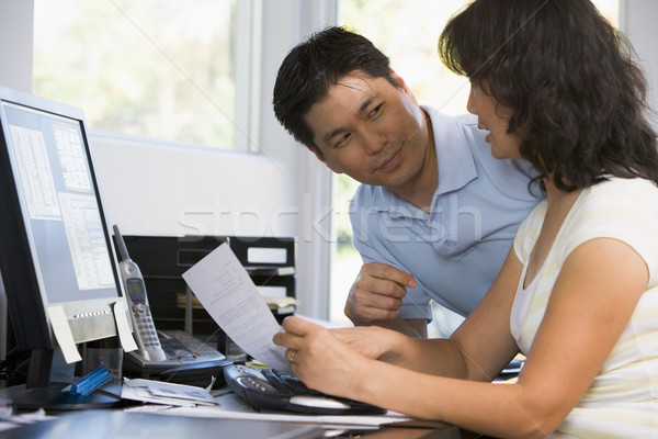 Couple bureau à domicile ordinateur paperasserie femme heureux [[stock_photo]] © monkey_business