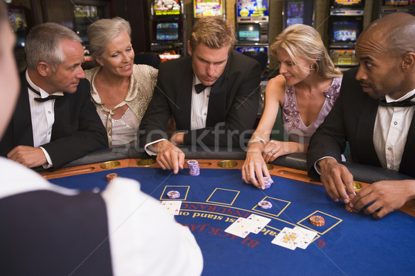 Csoport barátok játszik blackjack kaszinó öt ember Stock fotó © monkey_business