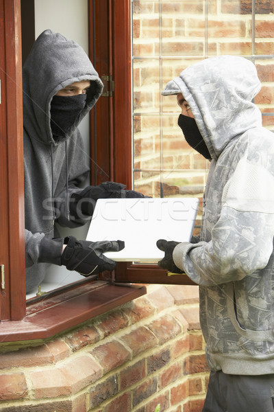 Young Men Breaking Into House Stock photo © monkey_business