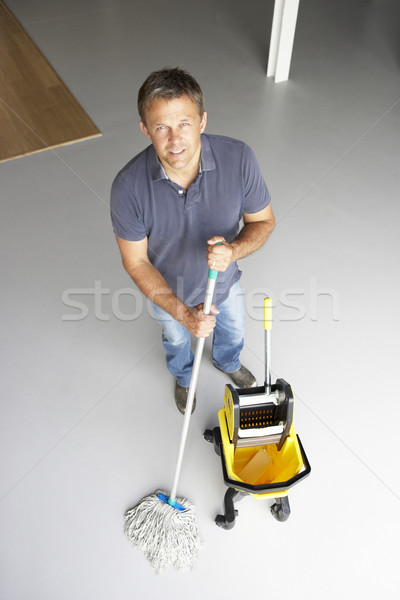 Cleaner mopping office floor Stock photo © monkey_business