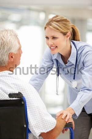 Young doctor with senior patient Stock photo © monkey_business