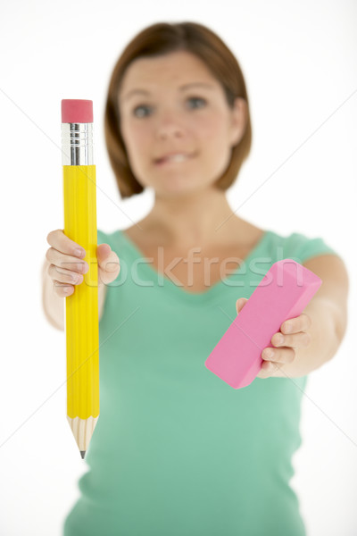 Woman Holding Big Pencil And Eraser Stock photo © monkey_business