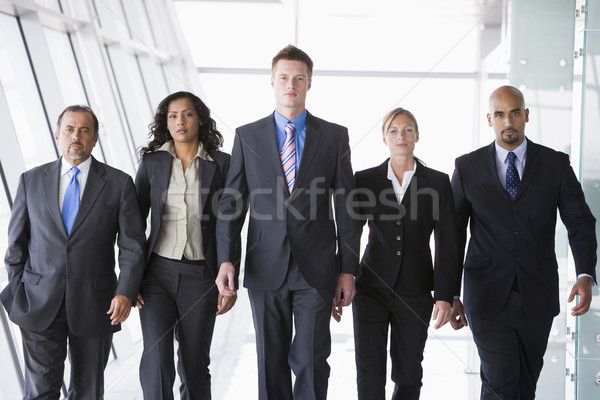 Group of business people walking towards camera Stock photo © monkey_business