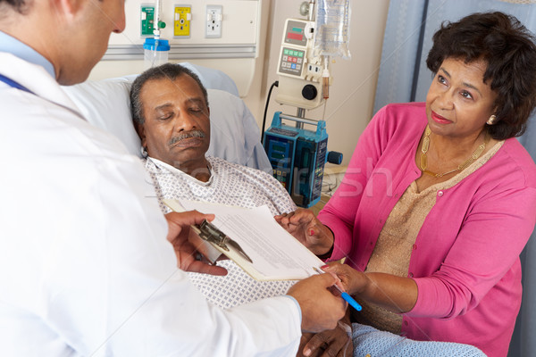 Doctor Explaining Consent Form To Senior Patient Stock photo © monkey_business