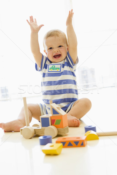 Stock photo: Baby indoors playing with truck