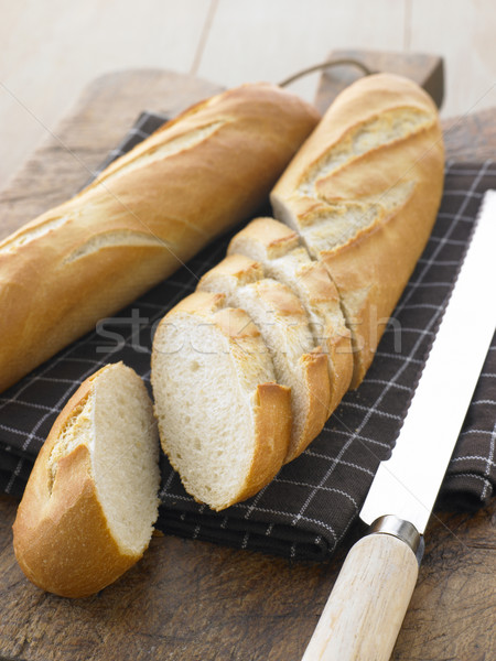 Szeletel francia kenyér étel kenyér kés szín Stock fotó © monkey_business