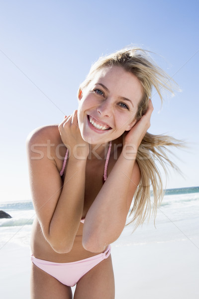 Stock photo: Young woman relaxing on beach