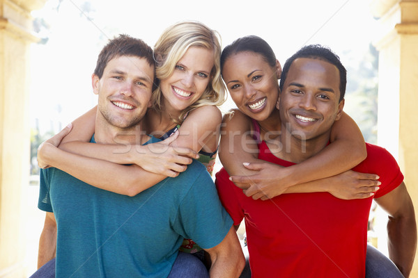 Stock photo: Group Of Young Friends Having Fun Together