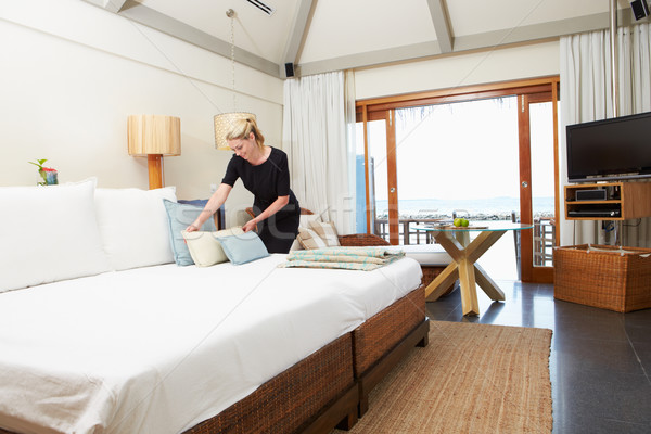 Hotel Chambermaid Making Guest Bed Stock photo © monkey_business