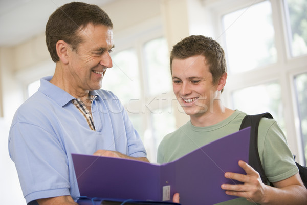 College professor providing guidance to a male student Stock photo © monkey_business