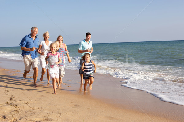 Retrato três geração família férias na praia mulher Foto stock © monkey_business