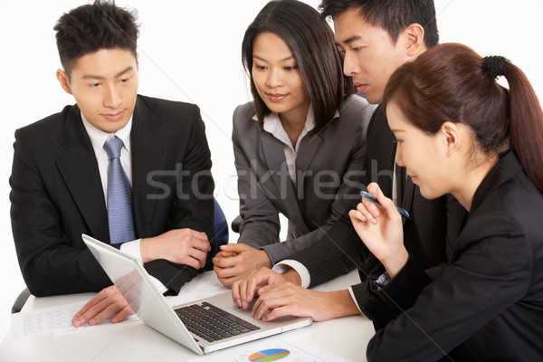 Studio Shot Of Chinese Businesspeople Having Meeting Stock photo © monkey_business
