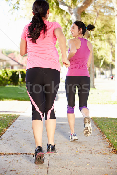 Hátsó nézet kettő női futók külvárosi utca Stock fotó © monkey_business