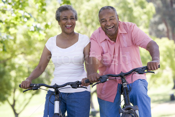 Idős pár bicikli nő férfi testmozgás bicikli Stock fotó © monkey_business