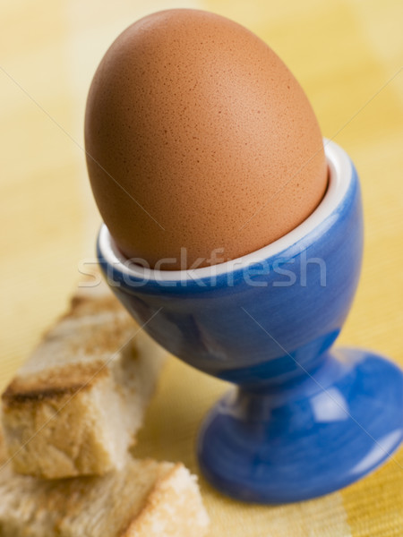 Suave huevo pasado por agua huevo taza tostado soldados Foto stock © monkey_business