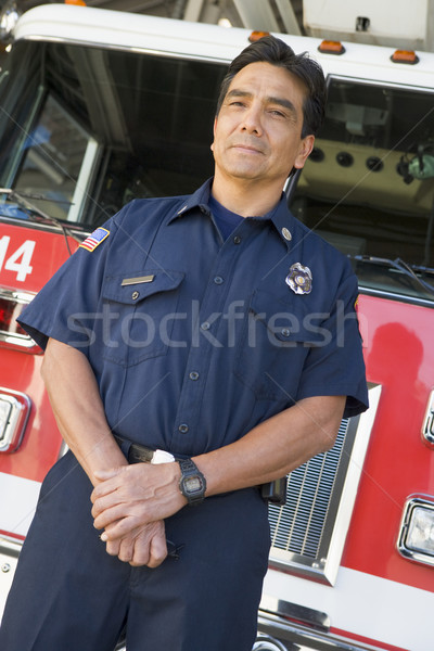 Retrato bombeiro carro de bombeiros cor em pé serviços Foto stock © monkey_business