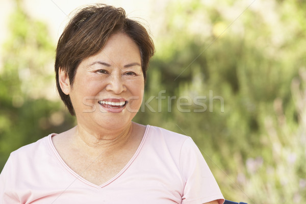 Uśmiechnięty starszy kobieta ogród asian osoby Zdjęcia stock © monkey_business