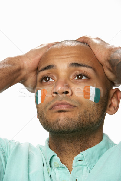 Disappointed Young Male Sports Fan With Ivory Coast Flag Painted Stock photo © monkey_business