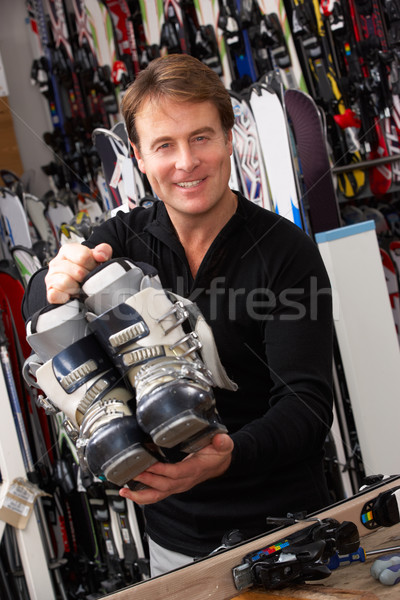 Sales Assistant With Ski Boots In Hire Shop Stock photo © monkey_business