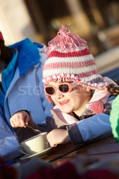 Jovem bebida quente feliz criança neve Foto stock © monkey_business