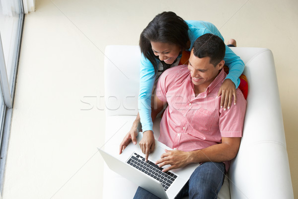 мнение пару расслабляющая диван используя ноутбук компьютер Сток-фото © monkey_business