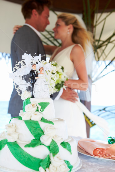 Beach Wedding Ceremony With Cake In Foreground Stock photo © monkey_business