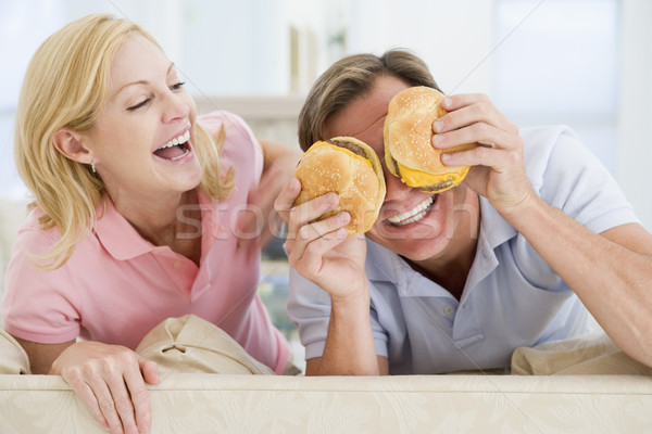 Couple Enjoying Burgers Together Stock photo © monkey_business