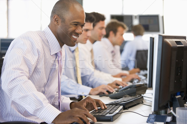 Voorraad werk kantoor gelukkig financieren glimlachend Stockfoto © monkey_business