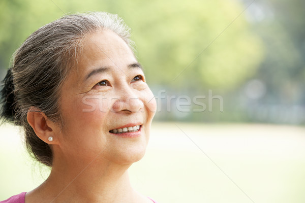 Fej vállak portré vonzó kínai idős Stock fotó © monkey_business