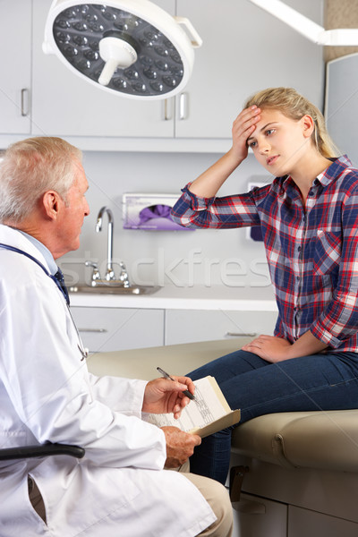 Teenage Girl Visits Doctor's Office With Headaches Stock photo © monkey_business