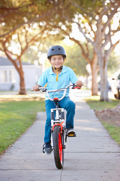Boy Wearing Safety Helmet Riding Bike Stock photo © monkey_business