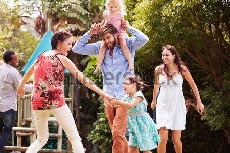Family Walking Along Wooden Bridge Stock photo © monkey_business