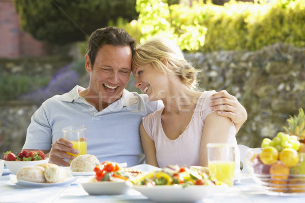 Couple manger repas femme alimentaire Photo stock © monkey_business