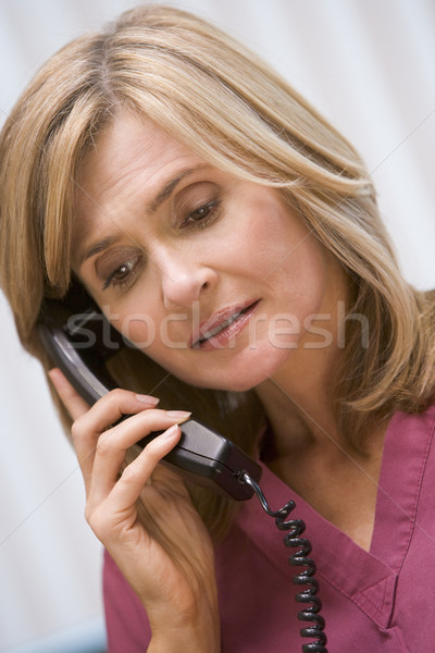Consultant phoning client with bad news Stock photo © monkey_business
