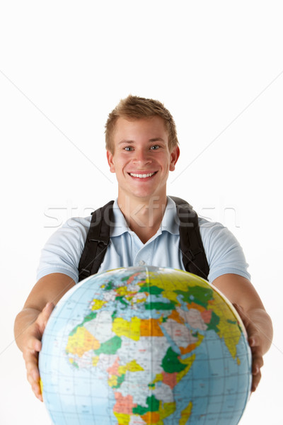 Jovem viajante globo homem mundo estúdio Foto stock © monkey_business