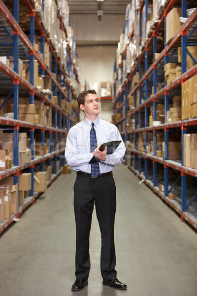 Manager In Warehouse With Clipboard Stock photo © monkey_business