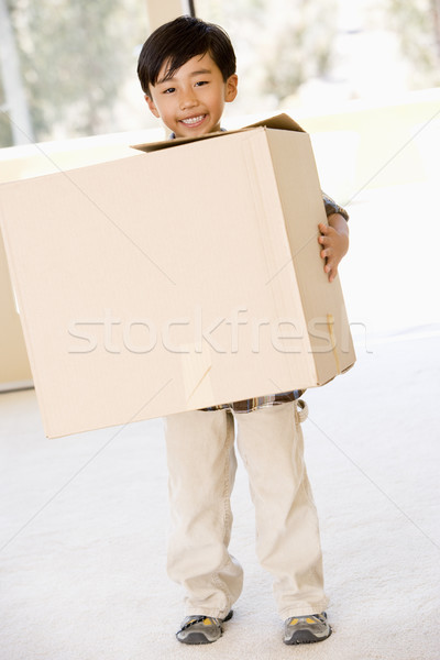 Fiatal srác doboz új otthon mosolyog ház boldog Stock fotó © monkey_business
