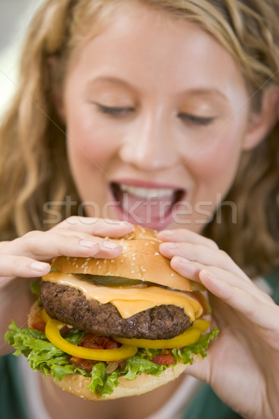 Teenage Girl Eating Burgers  Stock photo © monkey_business
