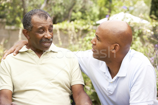 Senior Man Having Serious Conversation Adult Son Stock photo © monkey_business